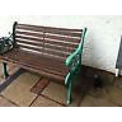 Cast iron and wooden slatted garden bench . Heavy bench. Free local delivery.